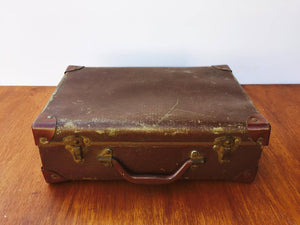 Small brown suitcase
