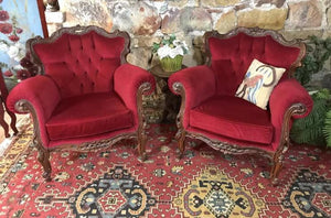Red Chesterfield arm chairs