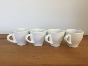 White tea cups and saucers