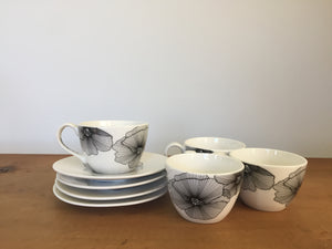Black and white tea cups and saucers
