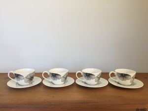 Black and white tea cups and saucers