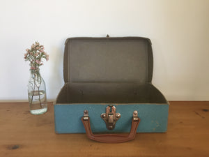 Small blue suitcase