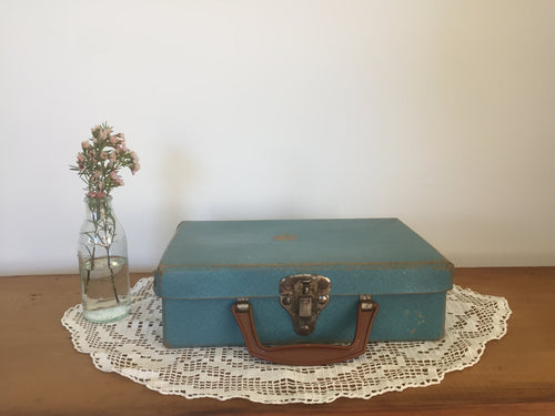 Small blue suitcase