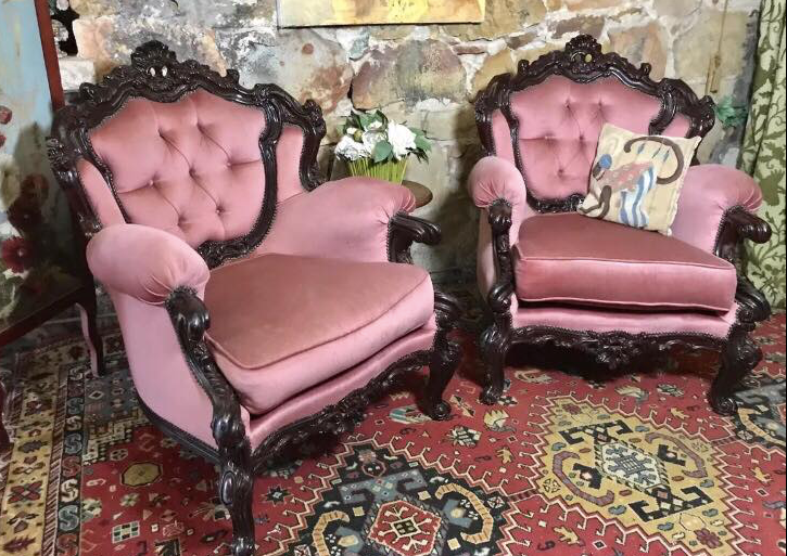 Pink Chesterfield arm chairs