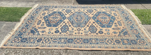 Blue and beige rug