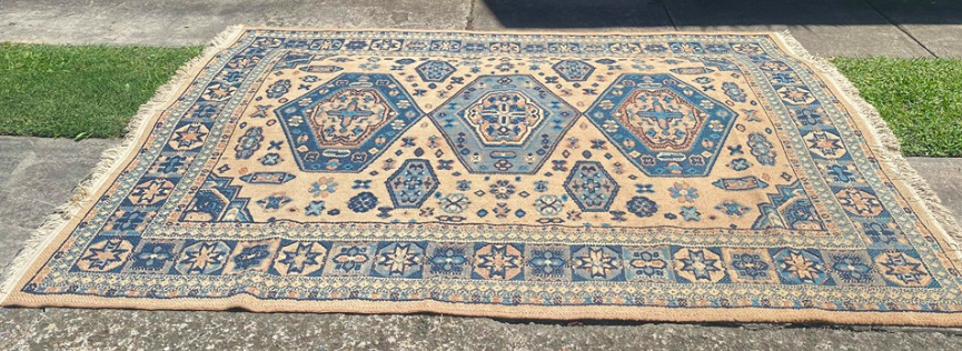 Blue and beige rug